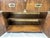 A beautifully crafted vintage Lane Campaign server cabinet featuring rich walnut veneers, fluted blind-door fronts, and...