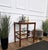 Unique and very elegant Italian Mid-Century Regency dry bar cabinet cart with two glass tiers and highlighted by the great...