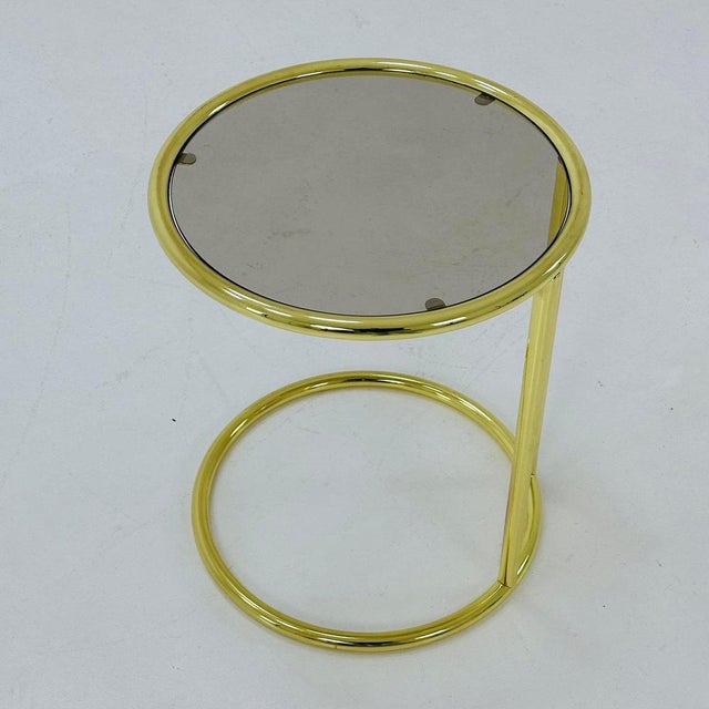 BauHaus Round golden chrome & Glass side table Eileen style , 1980s Designer side table , Golden chrome and glass surface...