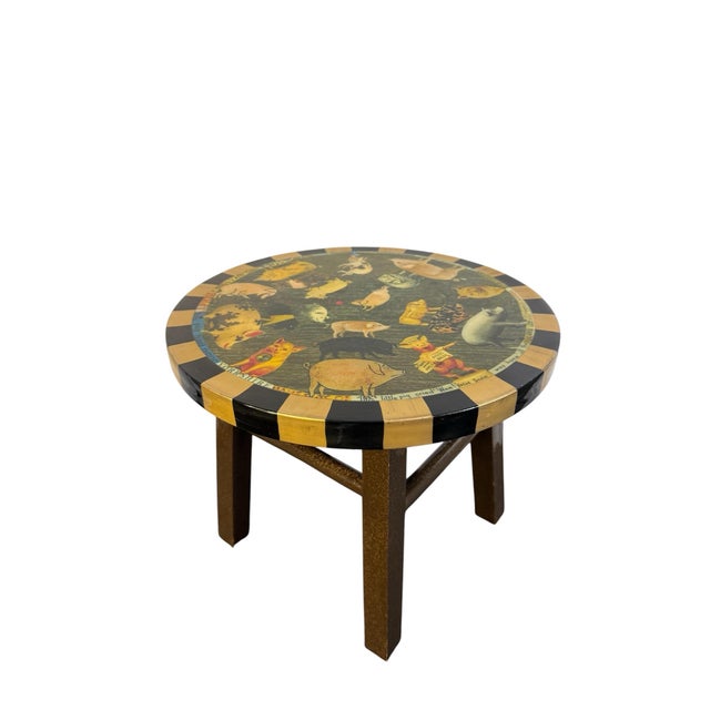 This whimsical Americana decoupage stool by California artist Annie Modica combines pig illustrations, vintage-style...