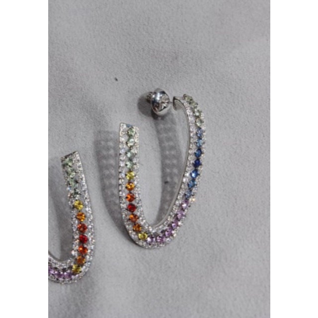 Gemstone details Diamond weight: 1.30 cts Multi sapphire weight: 8.48 cts 18K gold Net weight: 10.87 grams Gross weight:...