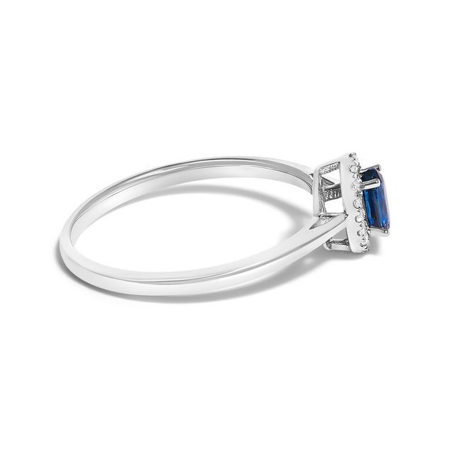Contemporary 10K White Gold 5X3MM Oval Blue Sapphire and Diamond Accent Halo Ring (I-J Color, I1-I2 Clarity) - Ring Size 5.5 For Sale - Image 3 of 7
