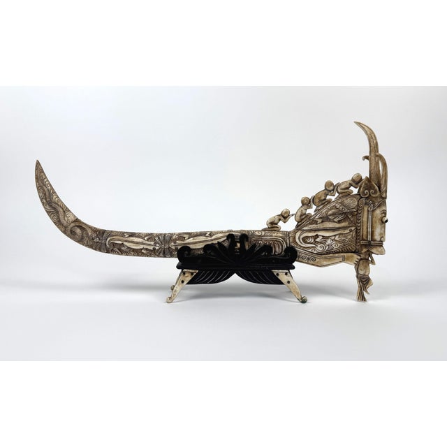Intricately carved Early 20th Century medicine horn from the Batak Tribe in Sumatra, Indonesia.