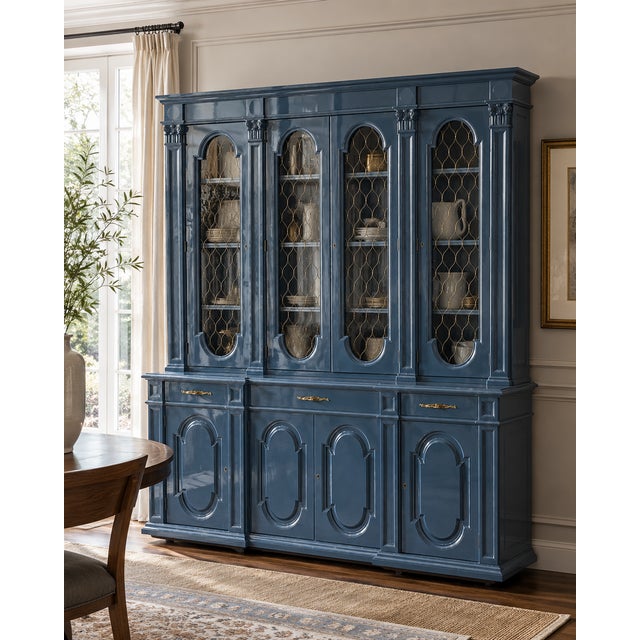 An exceptional breakfront china cabinet attributed to Karges Furniture, circa 1980s, showcasing the brand’s hallmark...