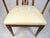 Unusual set of midcentury dining chairs manufactured by the American Furniture Company of Martinsville, Virginia. This set...
