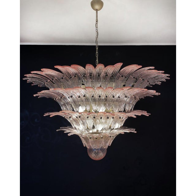 Palmette ceiling light made by 163 Murano pink glasses in a gold metal frame. Murano blown glass in a traditional way....