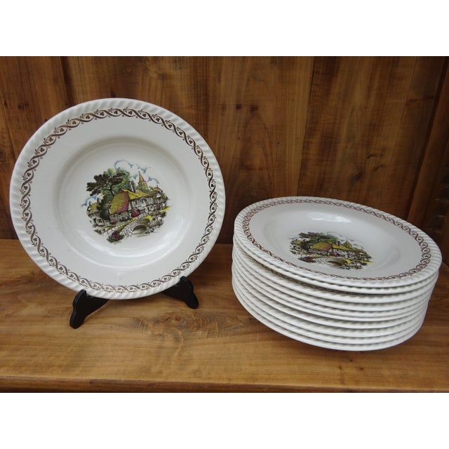 Set of 11 Lunéville earthenware soup plates. Made in Lorraine, France, between 1892 and 1923 by Keller & Guérin. Each...