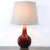 Decorative table lamp from Italy from the 1970s. The base is made of ceramic decorated with a very effective glaze called...