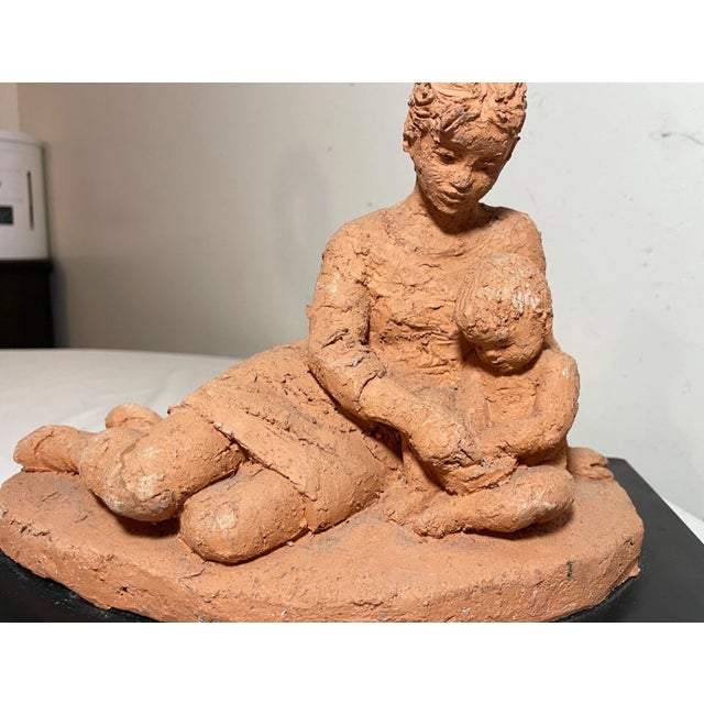 Up for sale is a wonderful handmade original pottery sculpture of a mother and child. This lovely sculpture is modeled out...