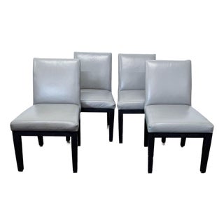 Set of Four Leather Dining Chairs With Wood Frame For Sale