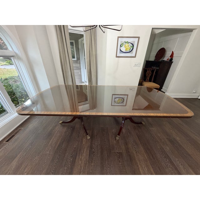 This is a traditional pedestal table from the Ethan Allen 1980s Georgian Court / Chippendale design collection. The table...