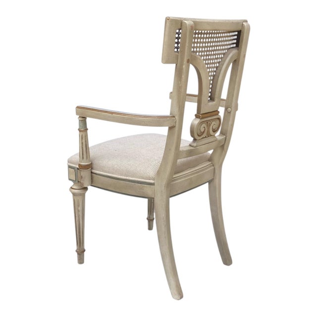 Really lovely Louis XVI armchairs bought in carved wood armchair with a caned backrest, upholstered seat, and fluted legs...