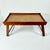 A lovely folding lap tray for breakfast in bed or working on your electrical devices. It features a wood frame in a deep...