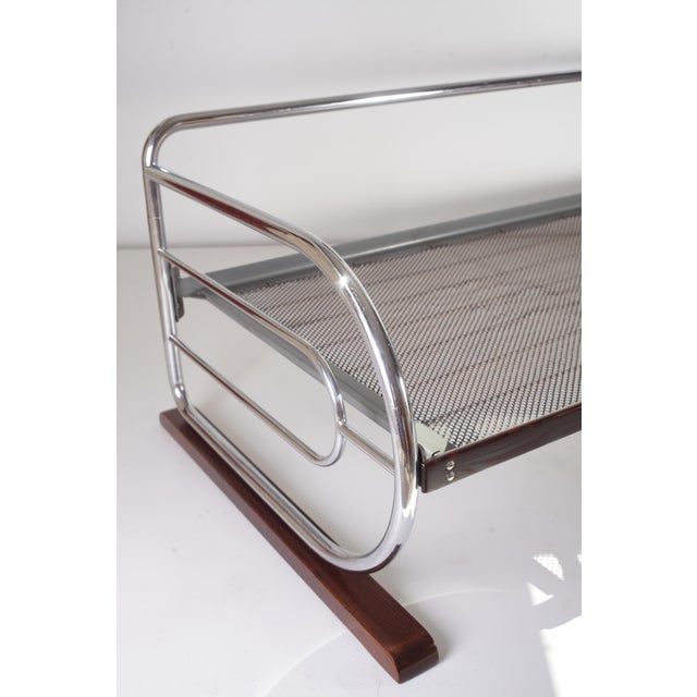 Bauhaus style tubular day bed or sofa with chrome plating in very good condition. Restored legs and spruce front paneling,...