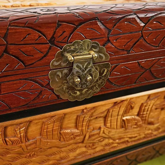 Oriental carved wooden chest Height: 48 Width: 85 Depth: 40 This piece is attributed to the mentioned designer/maker. It...