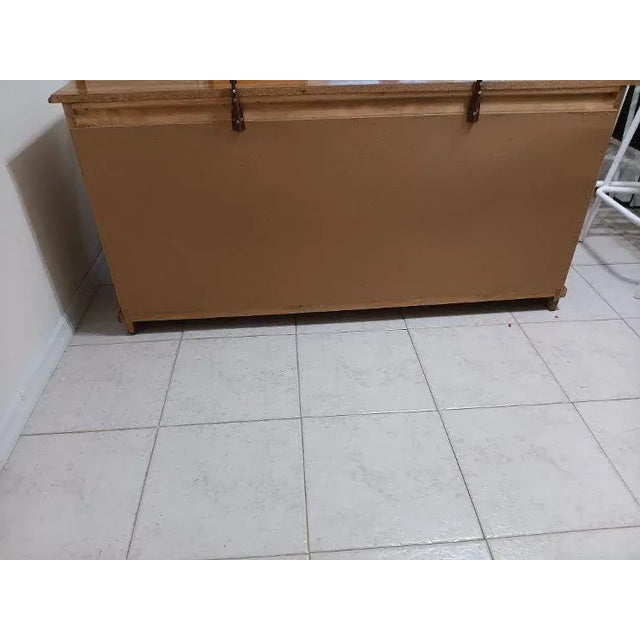 This vintage solid oak dresser features a rustic farmhouse style with seven drawers, perfect for a bedroom setting. The...