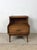 This mid century modern nightstand by Kent Coffey features hardwood construction, original walnut finish, unique step...