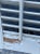 Pair of Vintage White Wood Interior Bifold Louver Window Shutters For Sale - Image 4 of 4
