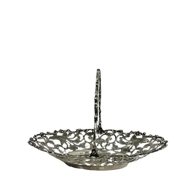 A dutch silver bonbon basket with movable handle, by g. Schoorl, 1956 a dutch silver bonbon basket with movable handle,...