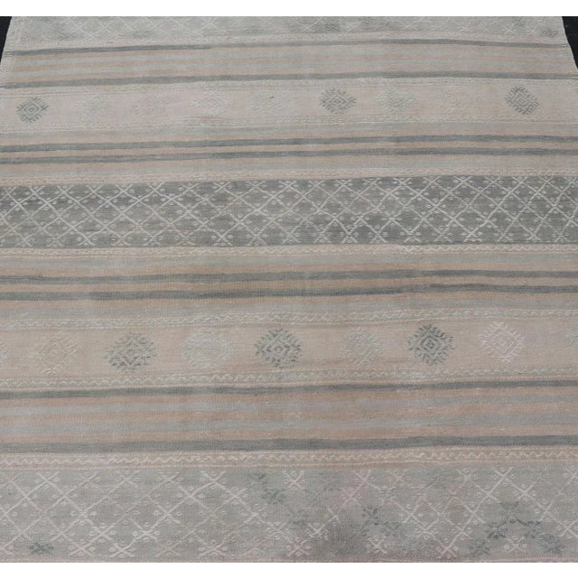 Square Vintage Turkish Kilim rug with horizontal stripes and tribal shapes. Keivan Woven Arts / rug EN-179781, country of...