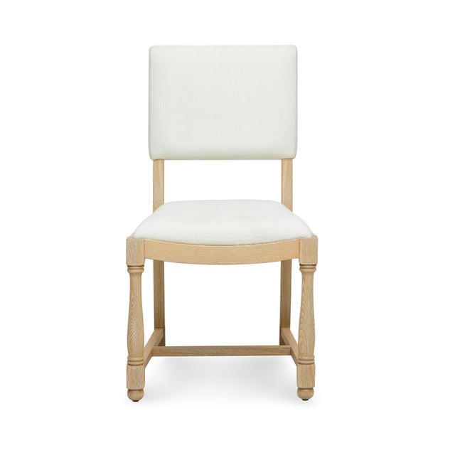 This comfortable, upholstered saddle seat dining chair will make your guests want to linger around the dinner table. Its...