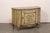 An Italian hand-painted, and shapely, wooden console cabinet from the 19th century. This antique credenza from Italy has a...