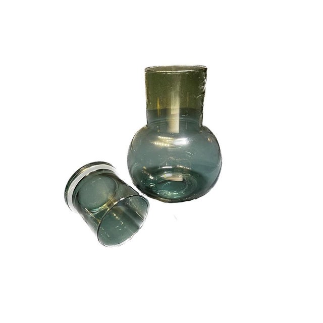 The Lausanne round carafe featured here, is an exercise in functional elegance. Hand-blown from high-quality glass, the...