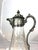 A stunning 19th century art nouveau claret jug which has the function for holding red wine and water. The jug has silver...