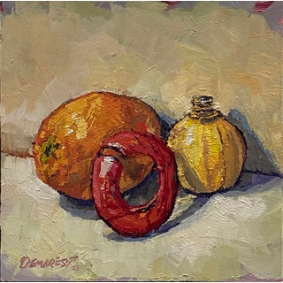 Analagous Orange, Lime Juice, & Madrid Can Wring by Delton Demarest | Oil on board Still life of an orange, lime, and a decorative can. For Sale