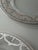 This set of 23 glass charger plates by Arte Italica, created in Italy in 2010, presents a refined interpretation of...