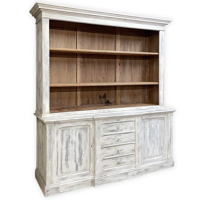 19th Century Grand French Neoclassical Bookcase in Whitewashed Pine is a magnificent reminder of the grandeur of the...