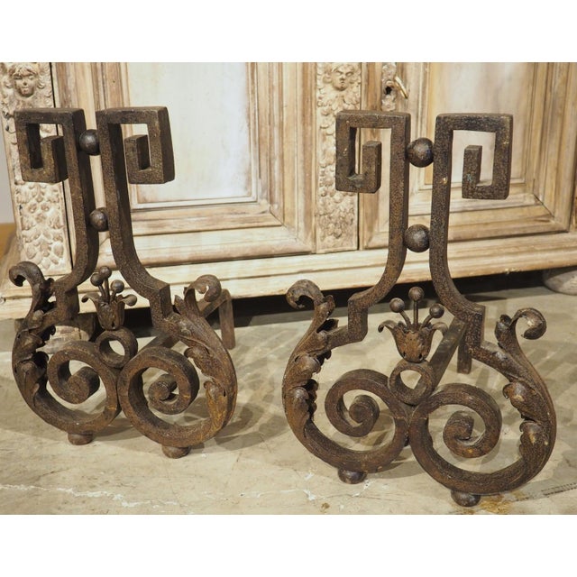 More information coming soon… This pair of French wrought iron and tole chenets from the 1940s wonderfully blends sinuous...