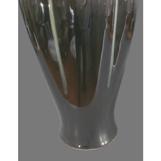Crafted with an eye for timeless design, this Vintage Mid-Century Modern Glazed Pottery Vase presents a stunning display...