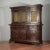 Carved bookcase sideboard with 3 closed doors, 3 drawers, and 3 doors on the upper part embellished with a wrought iron...
