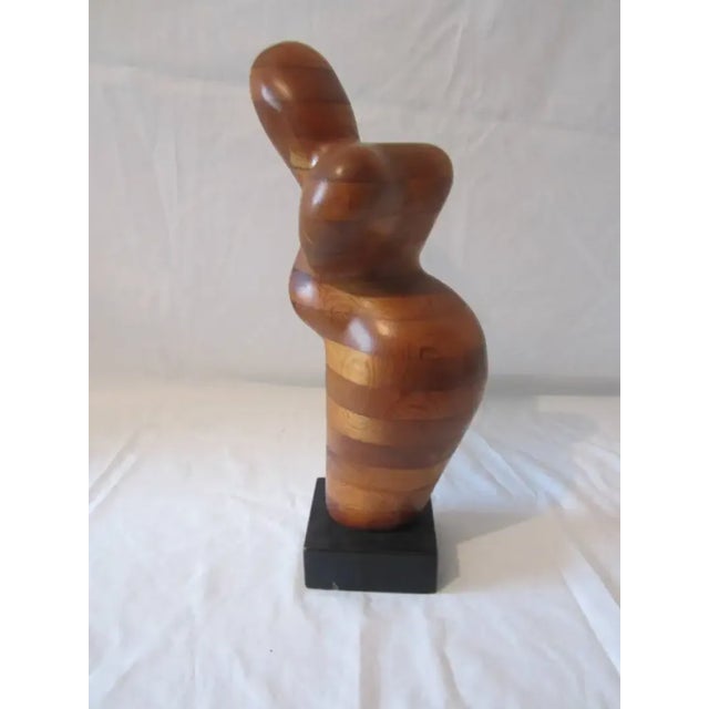 Figural craft decor piece.