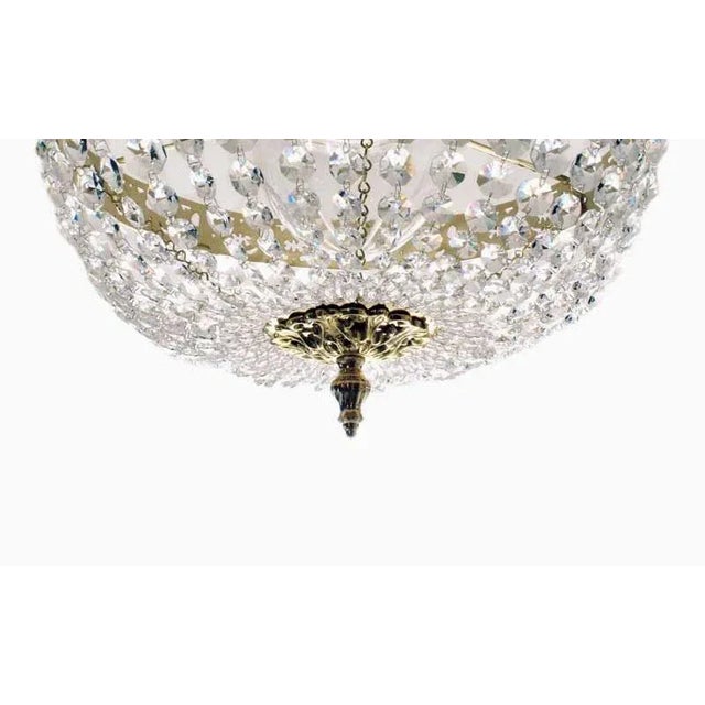 Nickel plated bathroom chandelier for low bathroom ceilings. This plafond bathroom chandelier has a nickel plated finish...