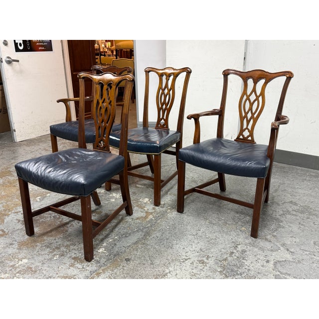 Design Plus Gallery presents a Set of Four Carved Mahogany Georgian Style Chairs. Their traditional elements consist of...