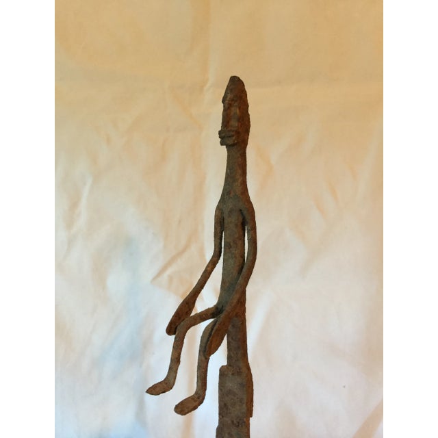 A ritual oil lamp coming from the Bamana of Western Africa. Forged in iron by the blacksmith or shaman, these held...