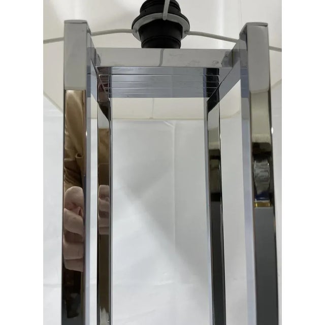 Italian Table Lamp in Chromed Steel, 1970s, in Flawless conditions. Designed 1970 to 1979 European Plug (up to 250V).The...