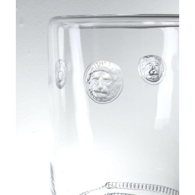 An exceptional and large crystal vase on pedestal with lions and ribbed trim, circa 1890. Chips to pedestal with old glue...