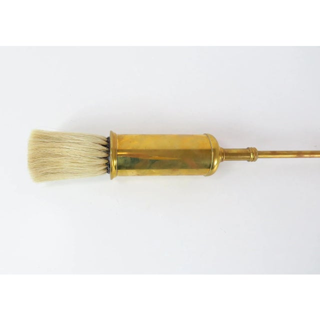 Antique telescopic brass fireplace brush / broom made in England by Benton & Stone. This brush has a long skinner handle,...
