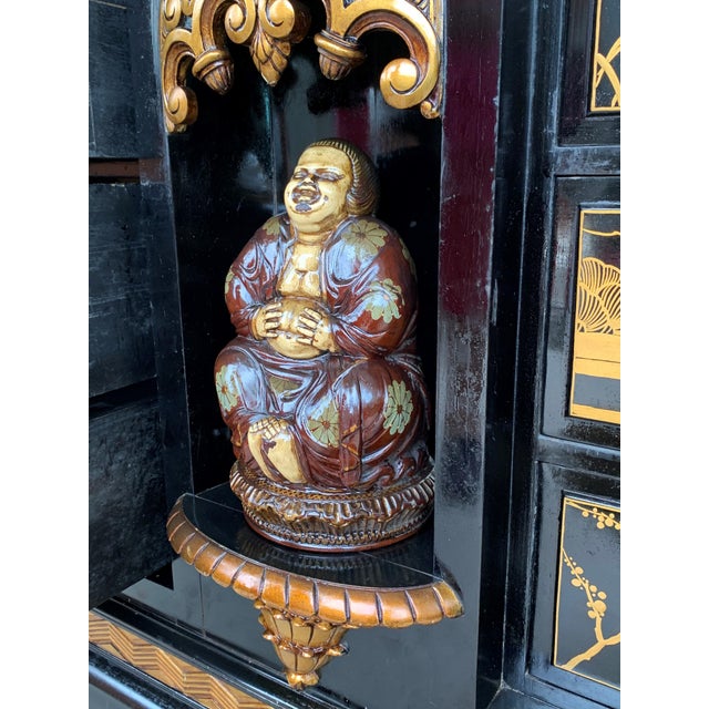 This incomparable chinoiserie black lacquer sideboard depicts figures in various typical traditional scenes. What more can...
