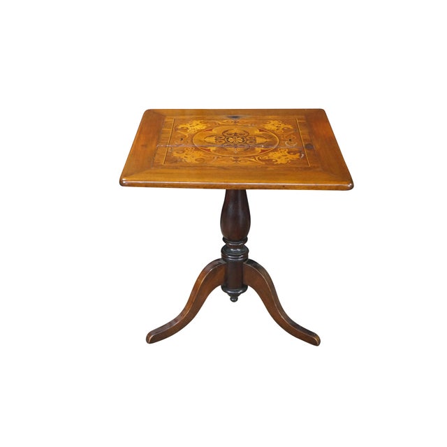 A remarkable antique Victorian mahogany tilt-top table features an exceptional, highly detailed marquetry and inlay square...