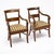 Elegant pair of early 19th century French Restoration period armchairs, circa 1820, crafted from solid walnut in the Rhône...
