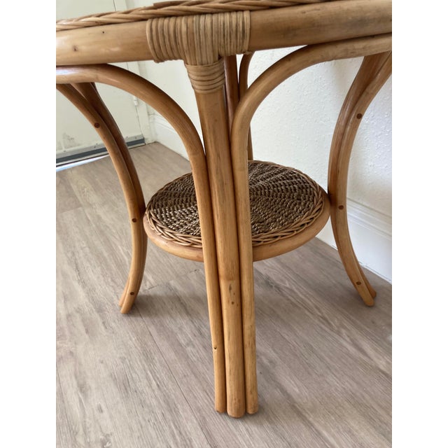 This is a beautifully constructed bamboo and rattan side table in excellent condition. A very sturdy and charming piece...