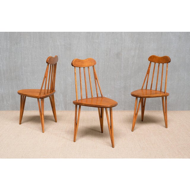 This exceptionally rare set of three chairs was designed by Bo Fjaestad and produced in Sweden in 1955. Each chair is...