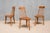 This exceptionally rare set of three chairs was designed by Bo Fjaestad and produced in Sweden in 1955. Each chair is...