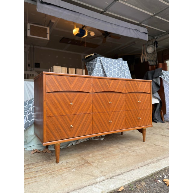 Incredible design on this iconic lowboy by Kent Coffey from the Debonaire line. Restored and ready for many more years to...