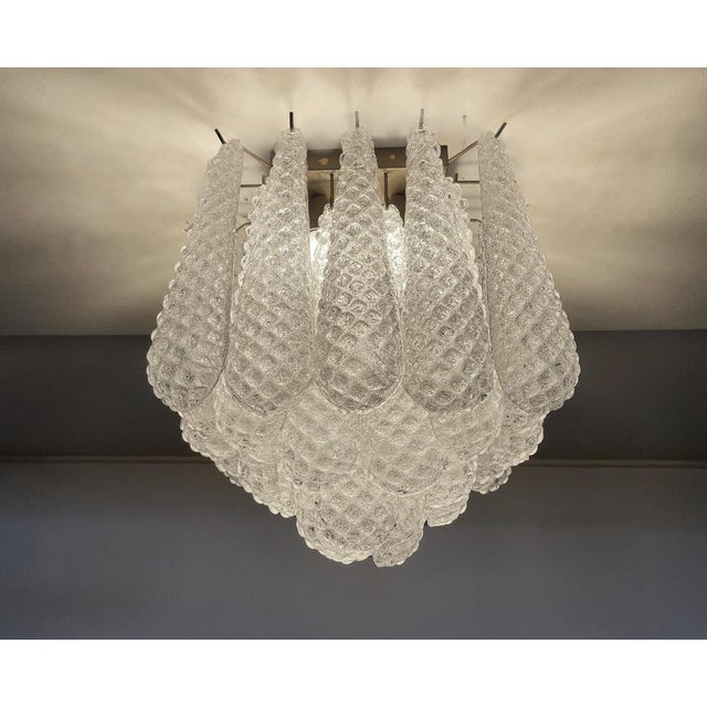 Spectacular ceiling lamp with 32 Murano Glasses in golden painted metal frame. Elegant lighting object. Period: late xx...