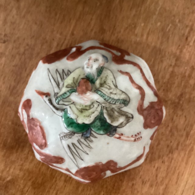 Antique Chinese Porcelain Ginger Jar With Molded Raised Eight Immortals on Wood Base For Sale - Image 9 of 12